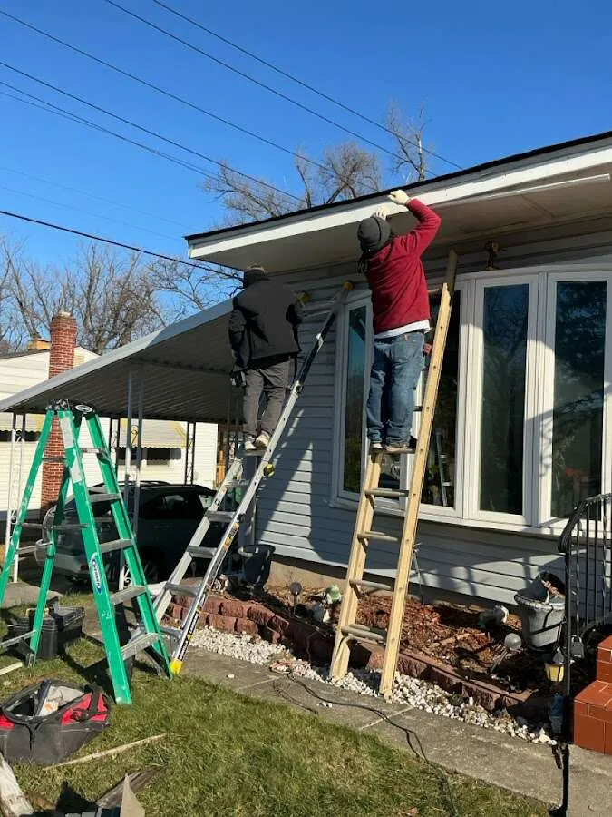 Restoration crew performing exterior repair in Hollymead
