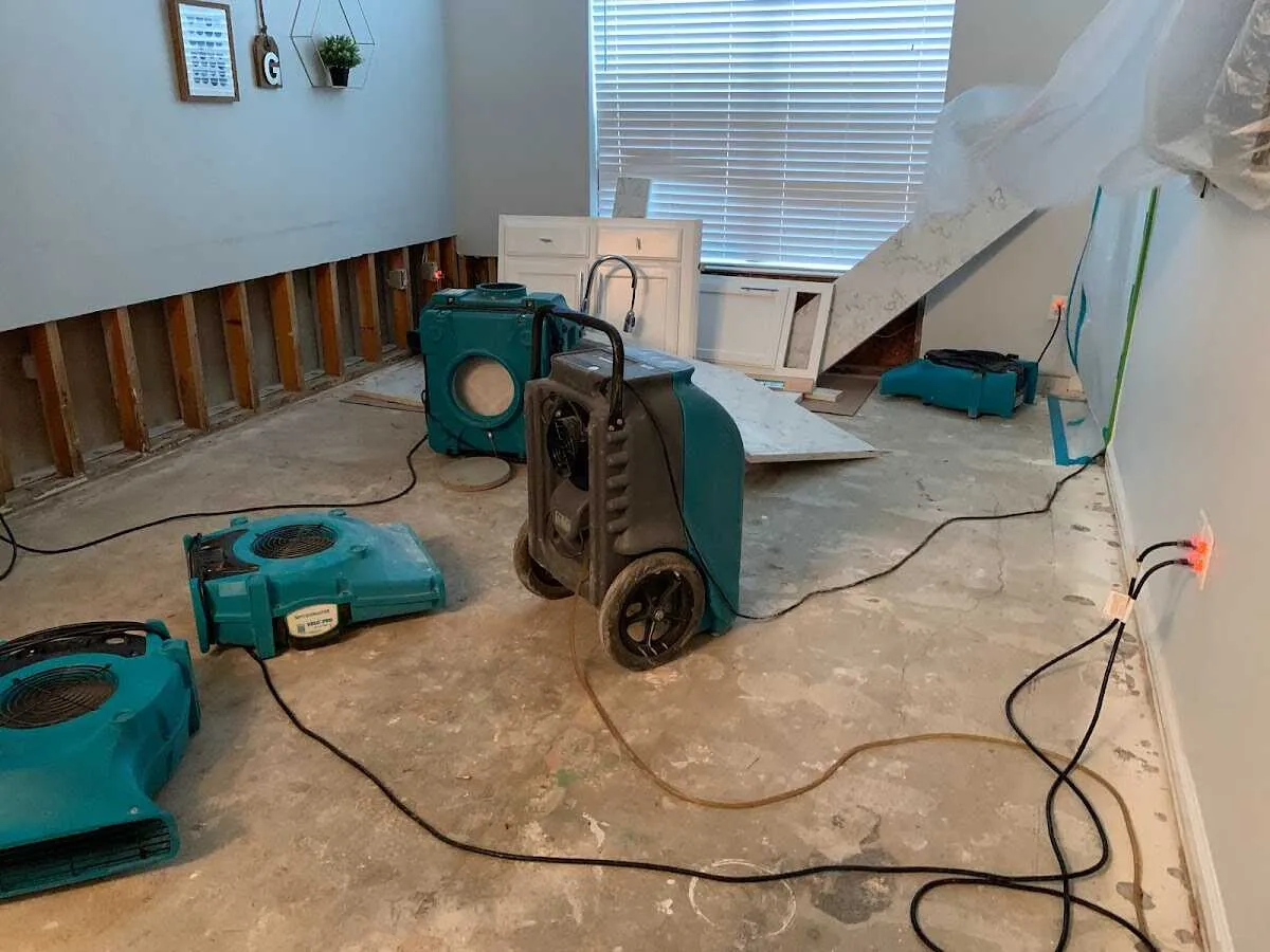 Dehumidifier in flood-cut room for Water Damage Restoration in Hollymead